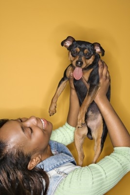 Woman and her dog.  https://www.info-on-high-blood-pressure.com/Pets-And-High-Blood-Pressure.html