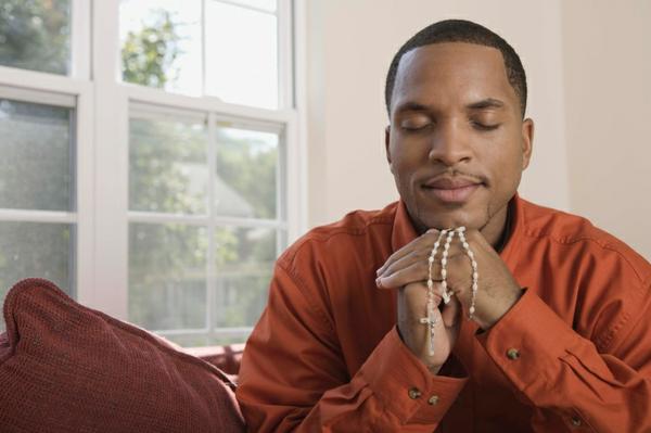 man with beads meditating.  https://www.info-on-high-blood-pressure.com/mental-health-journey-with-dr-ashley-harvey.html