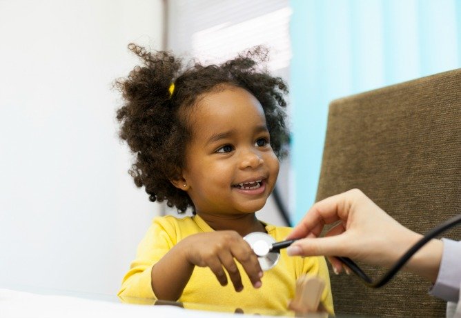 Child with high blood pressure. https://www.info-on-high-blood-pressure.com/Children-Blood-Pressure-Monitors.html